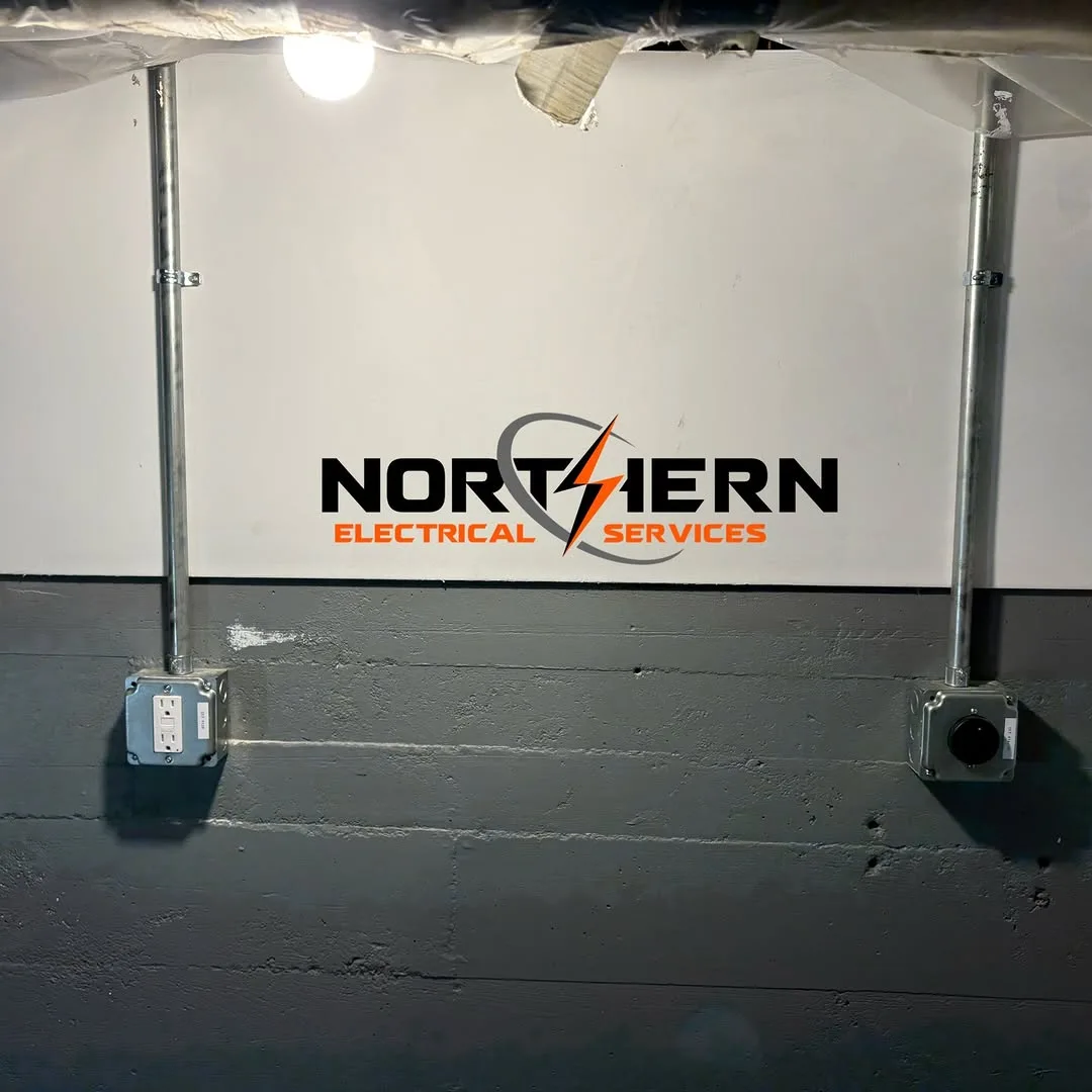 Twin conduit drops feeding GFCI outlets