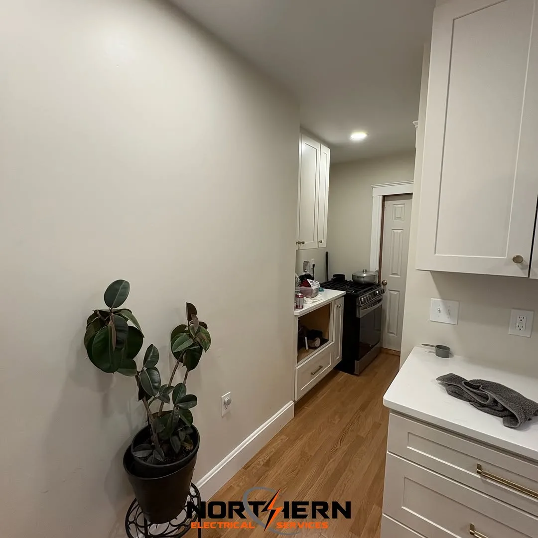 Finished kitchen with layered lighting